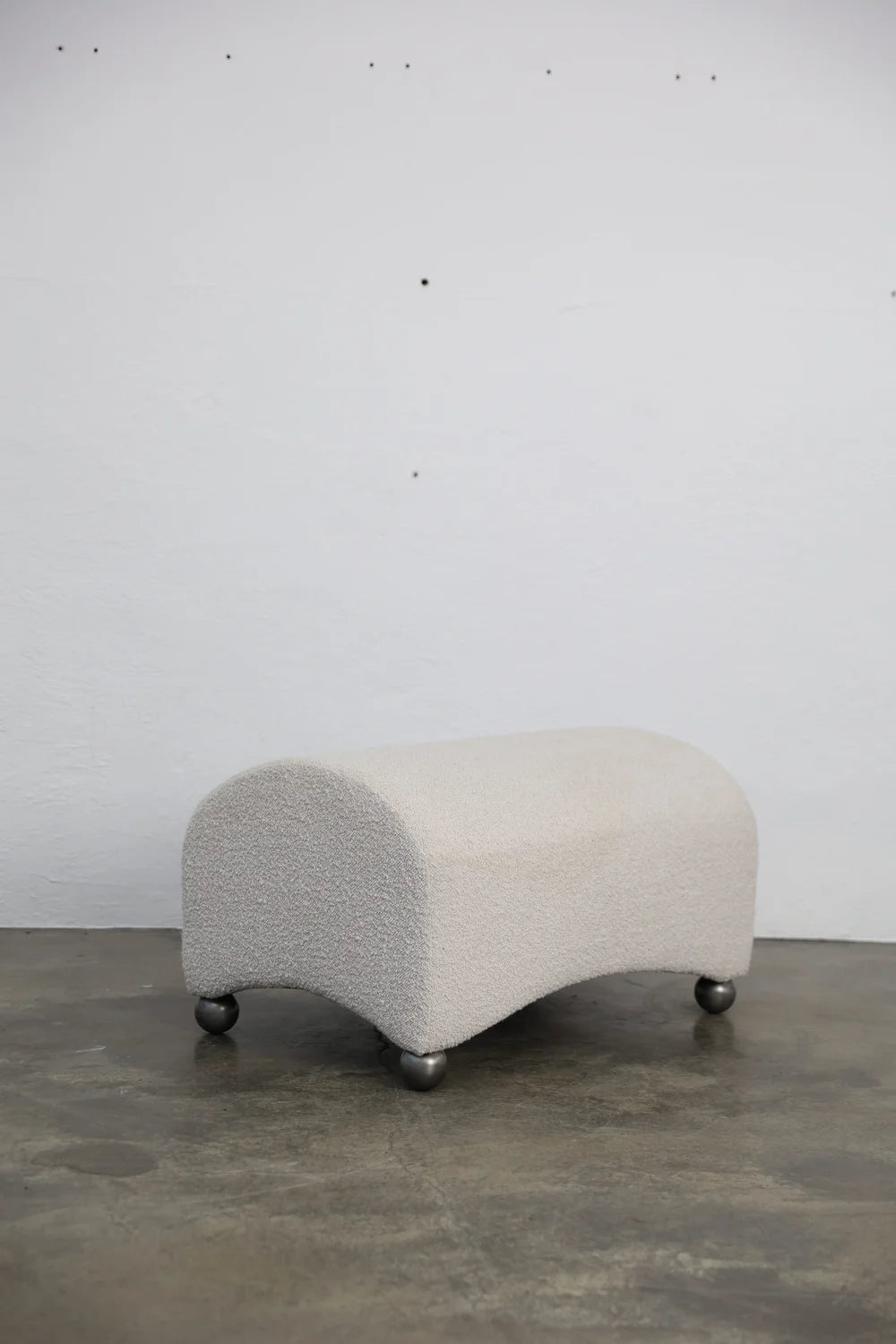 Upholstered ARC Pouf