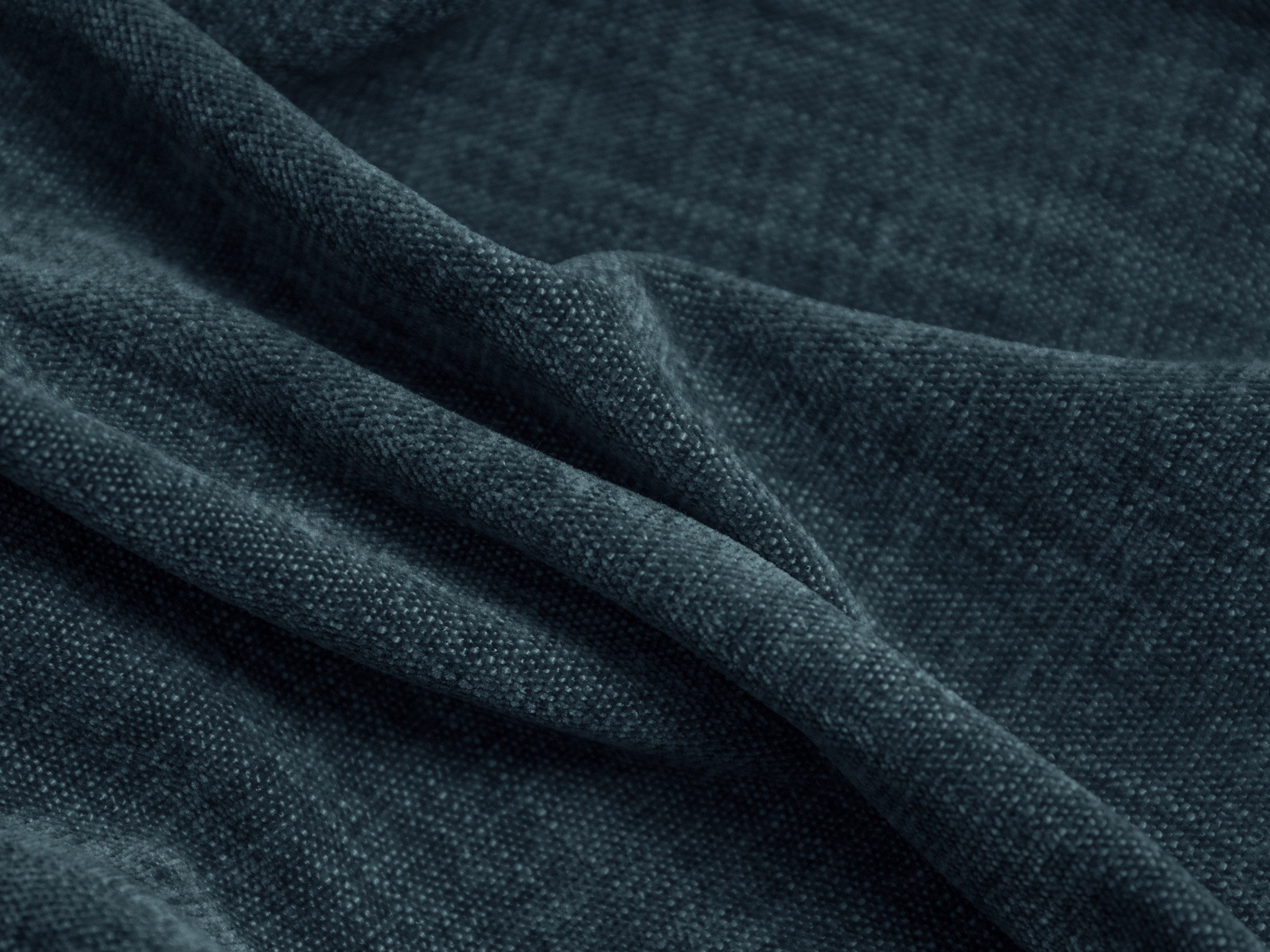Left-hand corner of 2-person blue denim