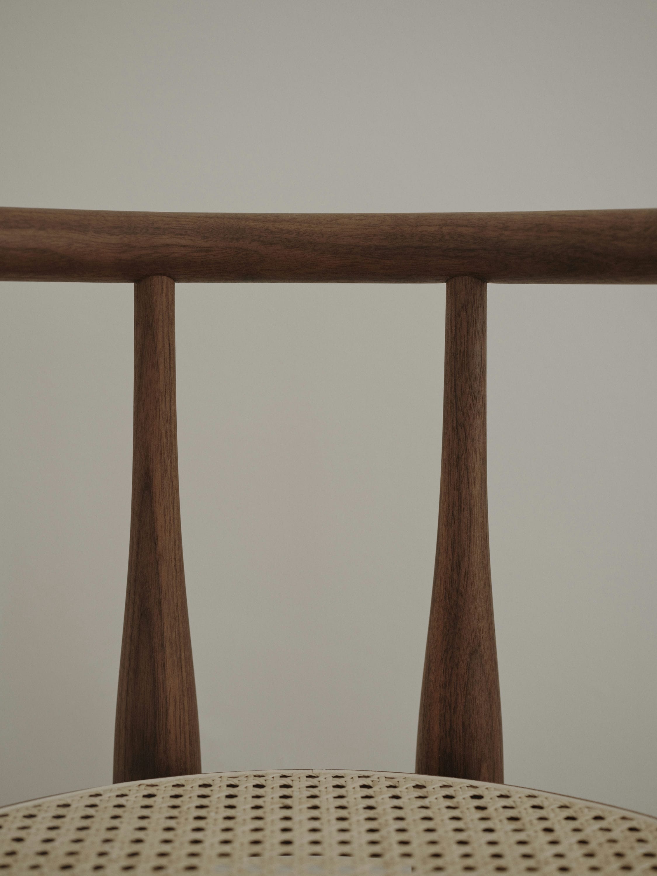 Bukowski chair braided seat with a nutty base