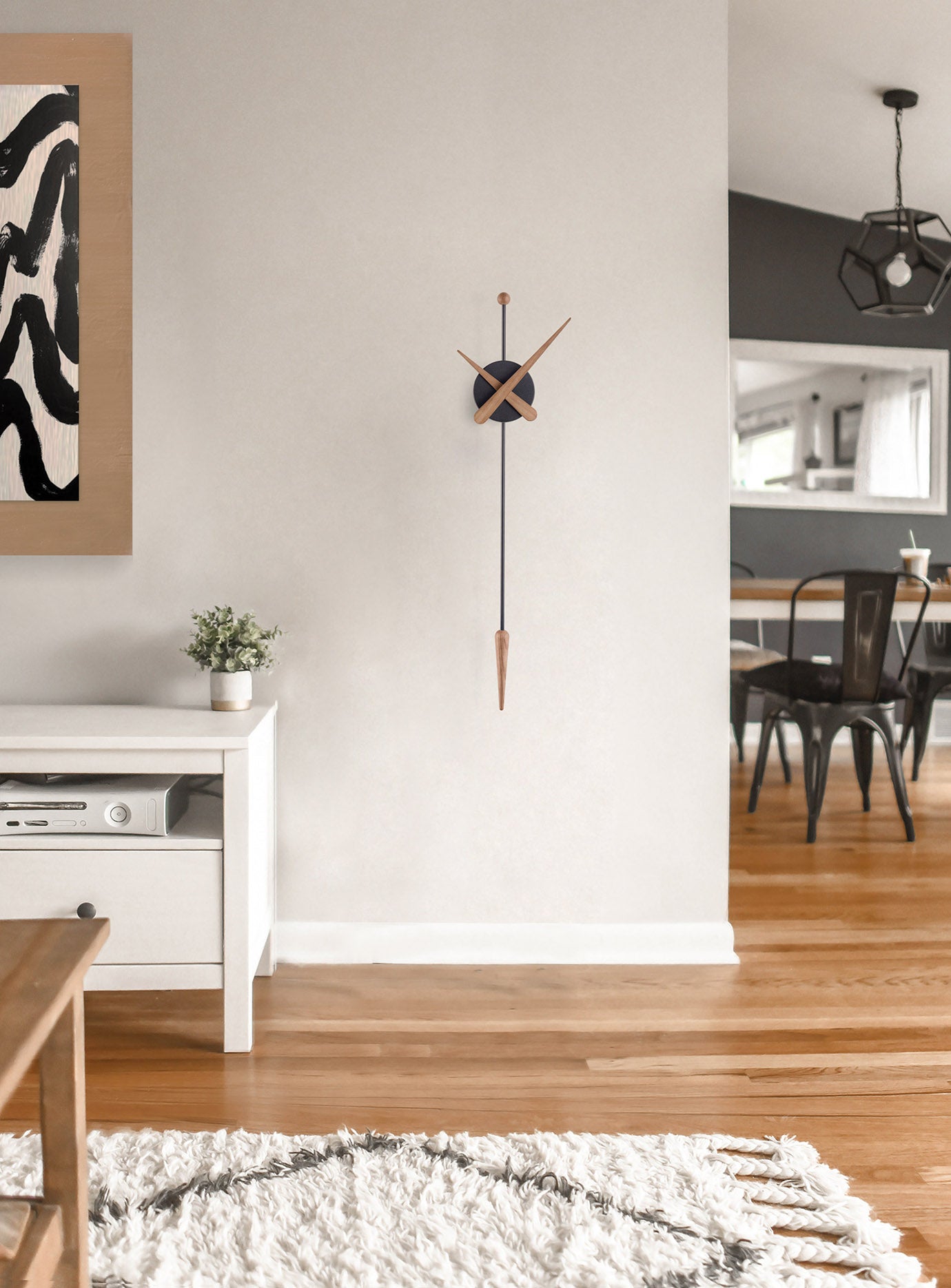 PUNTA wall clock in oak wood with black