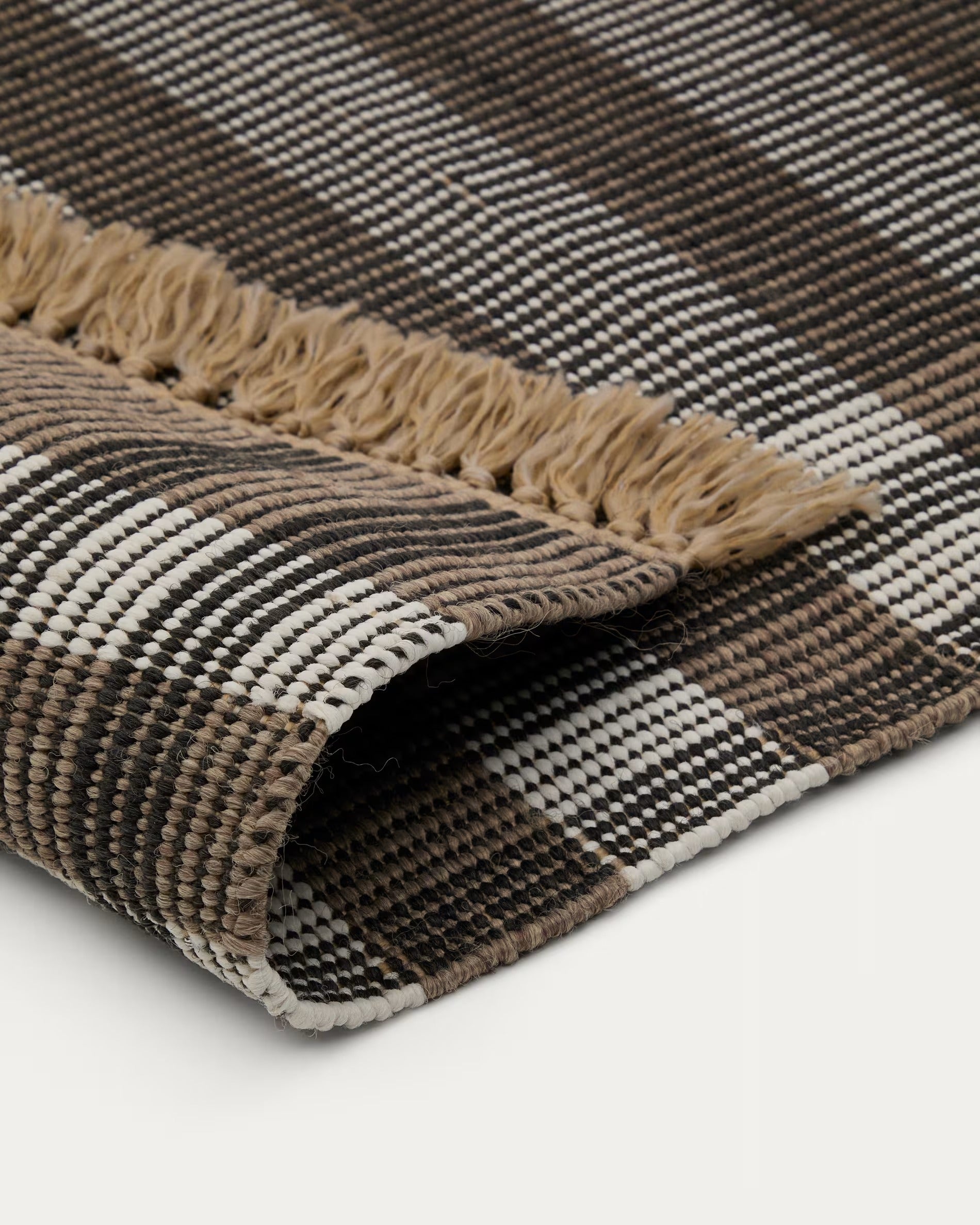 Schafsfellteppich braun kariert