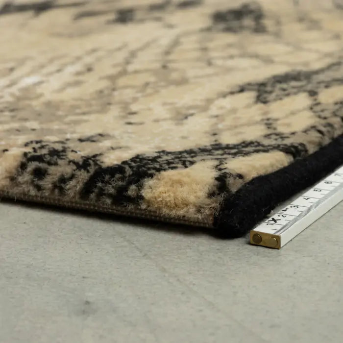 KEEP YOUR ENEMIES CLOSER rug in brown snake print