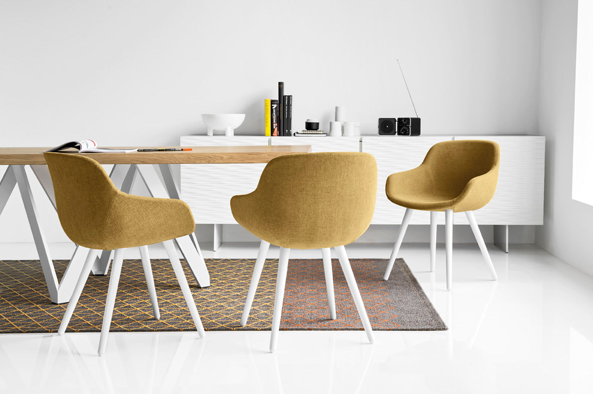 IGLOO upholstered chair with a dark wooden base