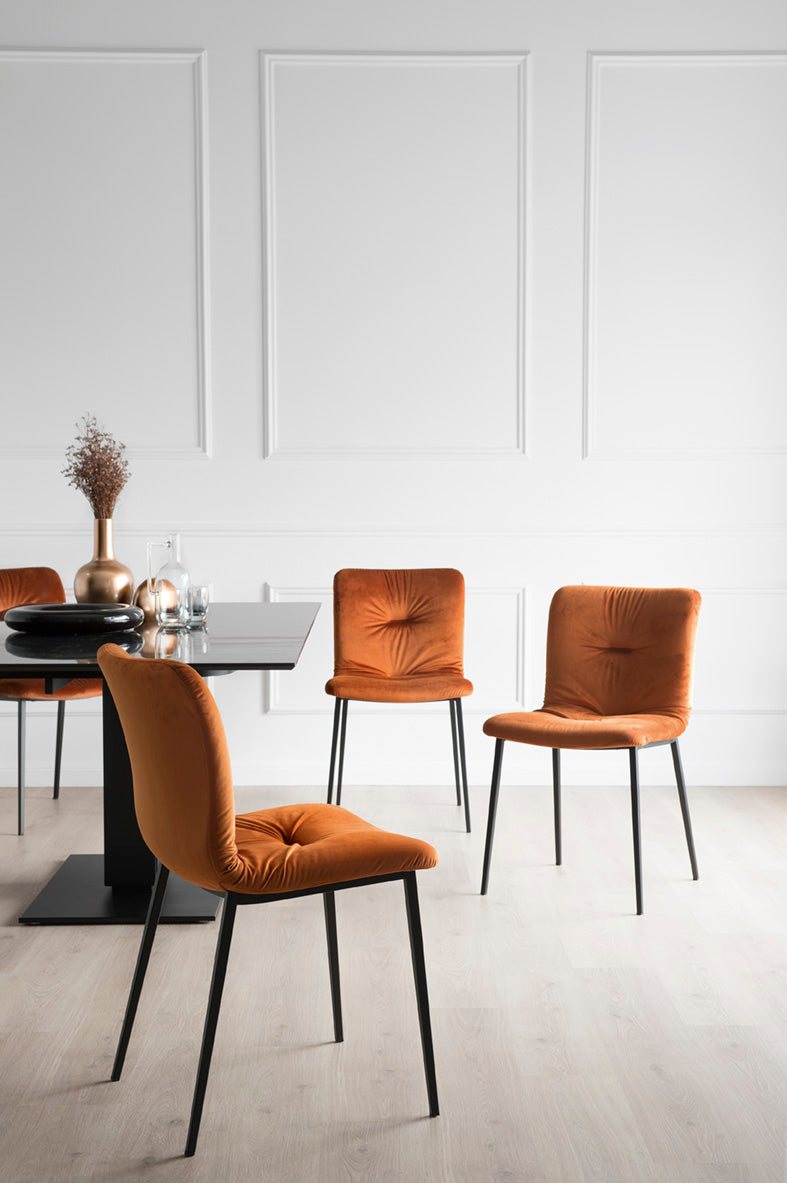 ANNIE SOFT upholstered chair with a black metal base