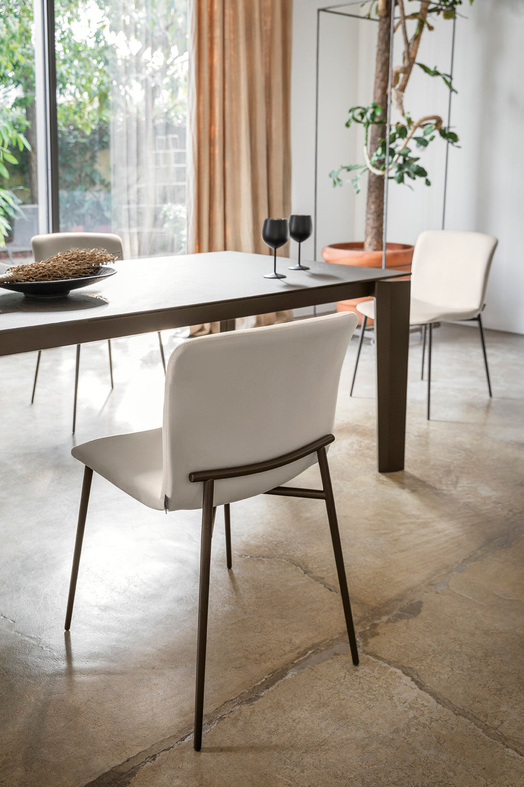 LOVE upholstered chair with a black base