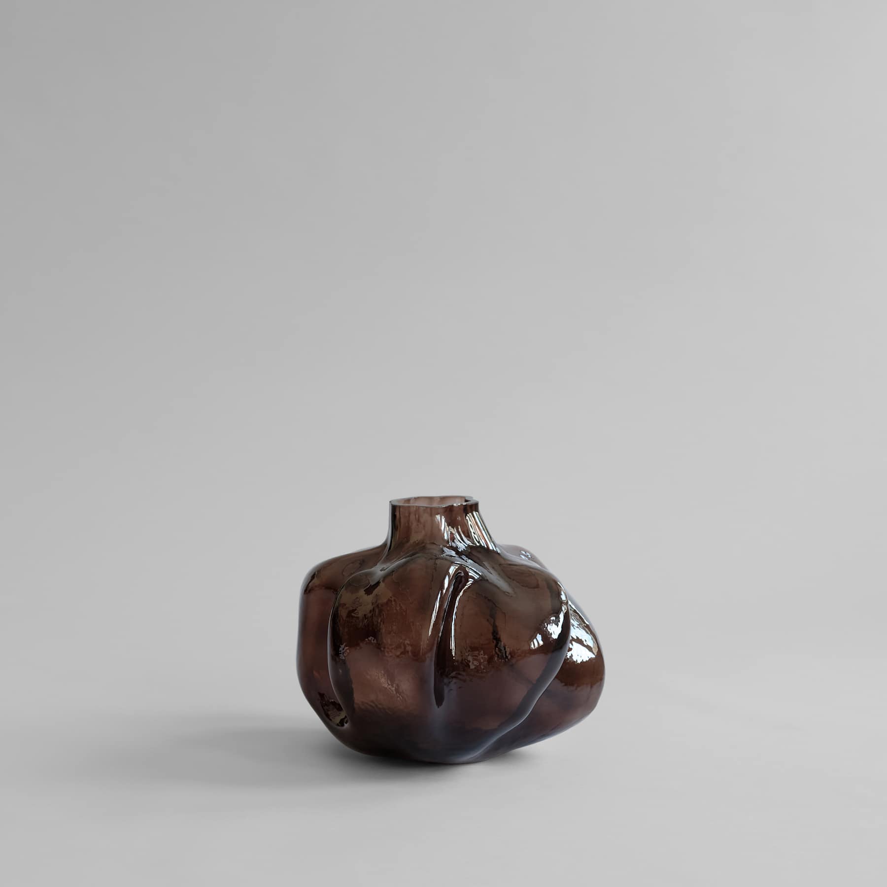 The vase is attracted to brown glass