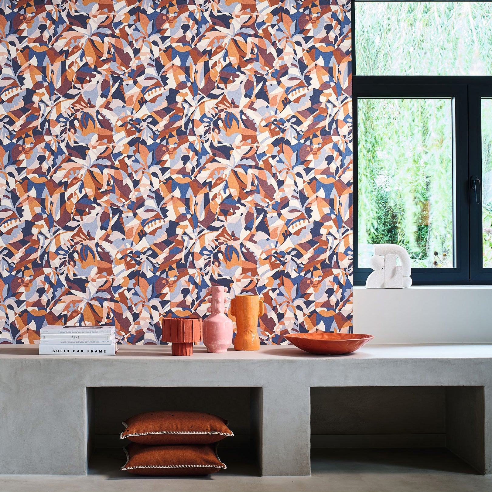Abstract patterned wallpaper with a botanical motif PLONGEON - MARINE/TERRACOTTA navy blue with terracotta