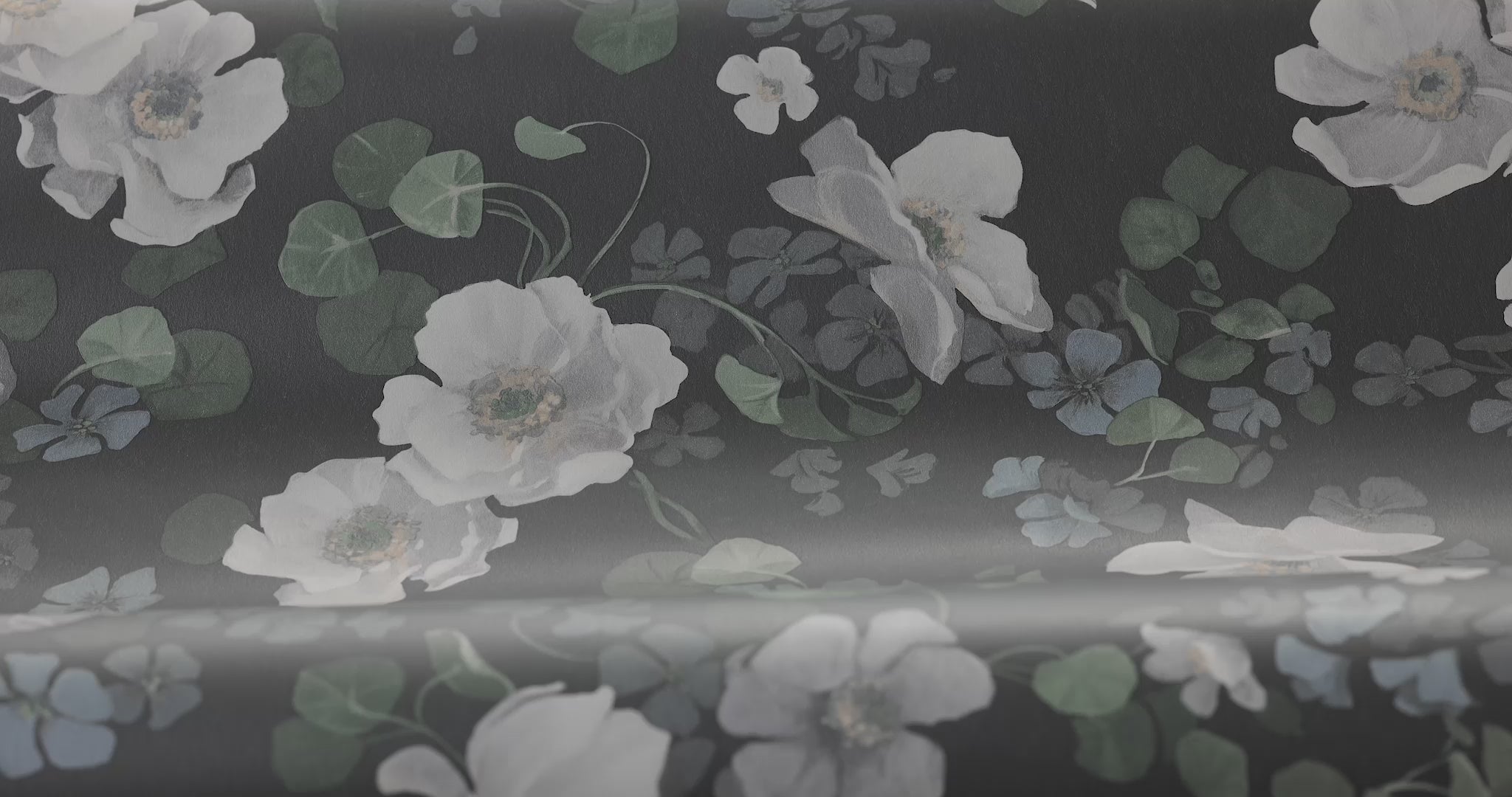 Non-woven paper wallpaper with an enchanting flower pattern in dark gray with white